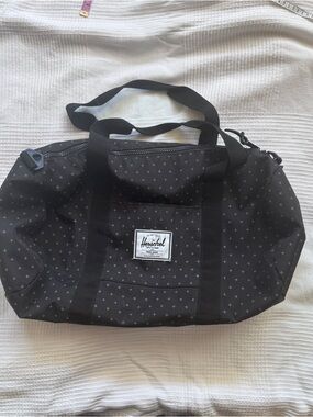 Herschel Sutton duffel bag Swiss cross pattern
